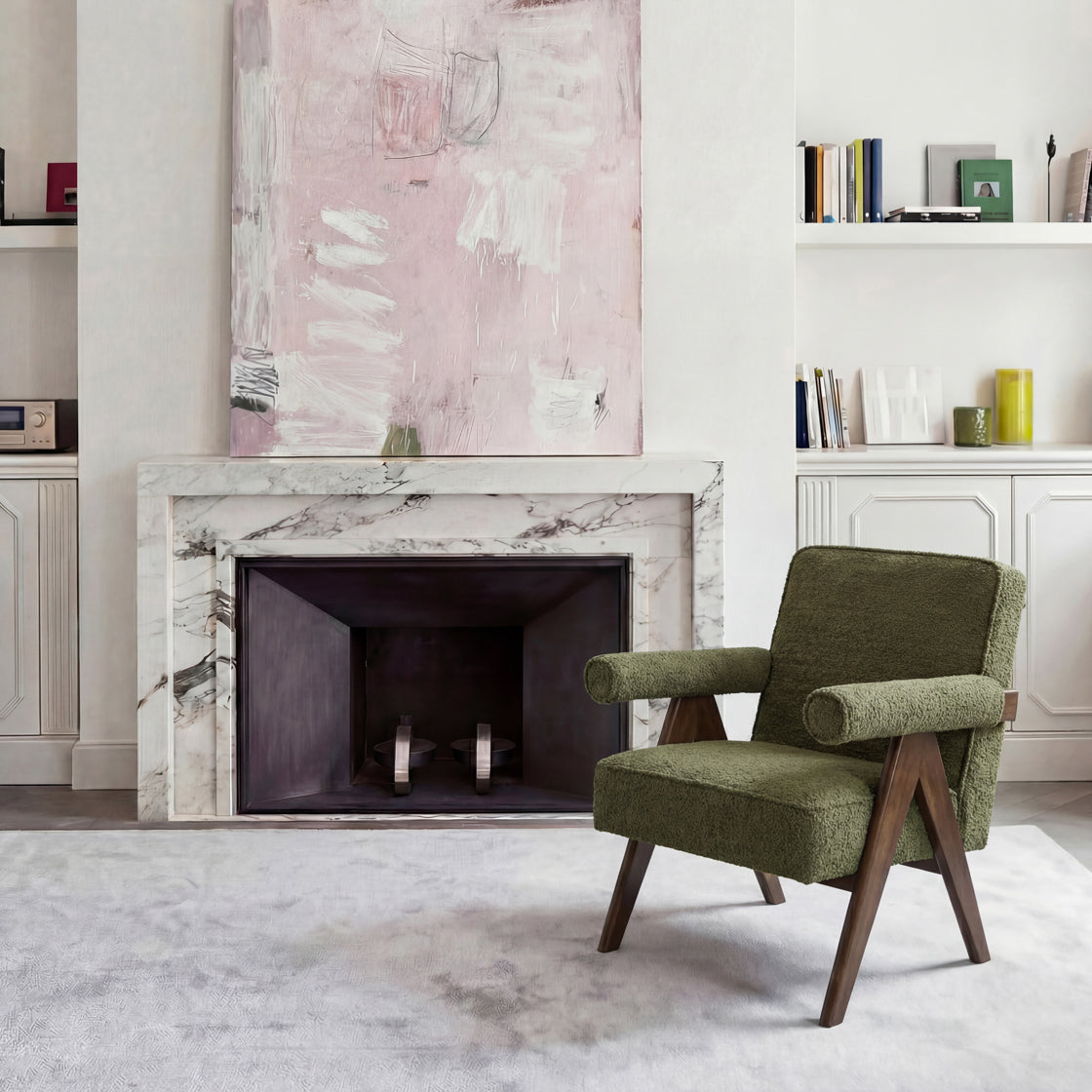 Green Herringbone and wooden armchair in a neutral living space