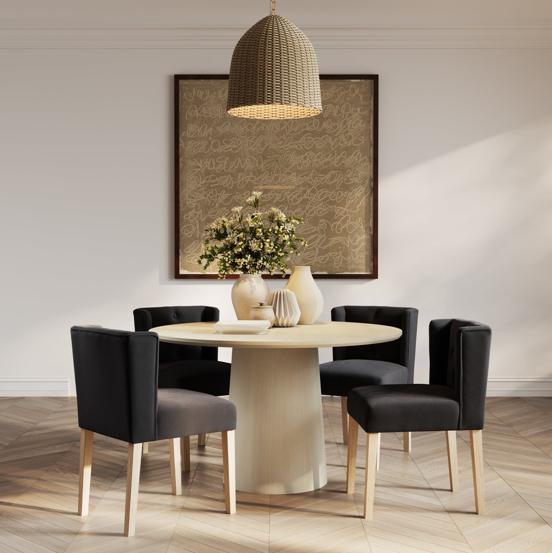 Dark grey linen chair with wooden legs and a beige round table