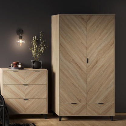 Chevron pattern wardrobe and chest of drawers in oak 