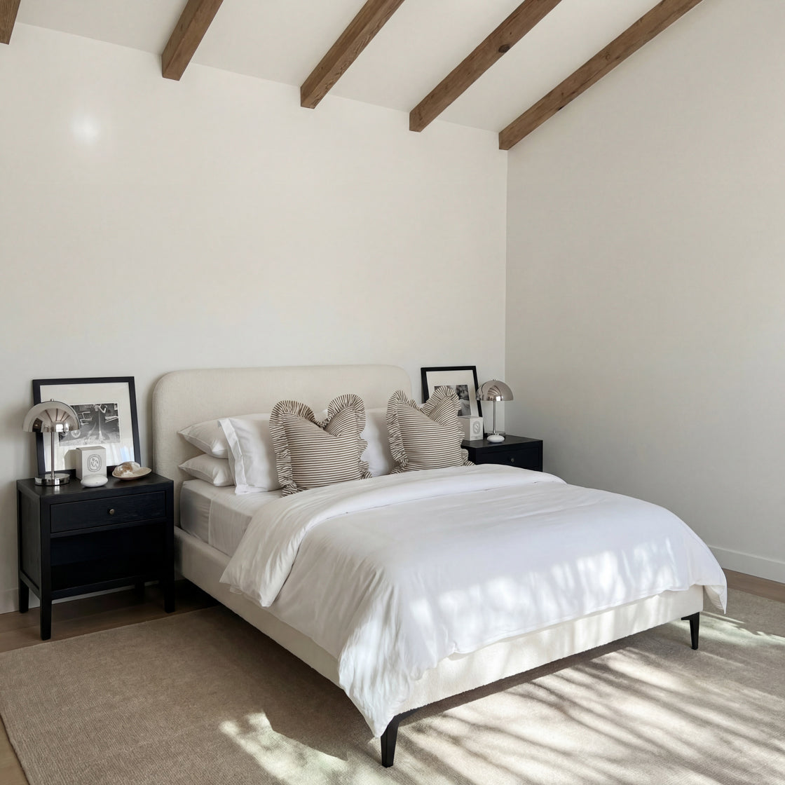 Cream Boucle King Bed with rounded headboard in a neutral coloured bedroom