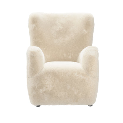 Cream fur fabric wing backed armchair 