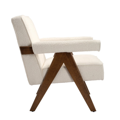 White Boucle and wooden armchair
