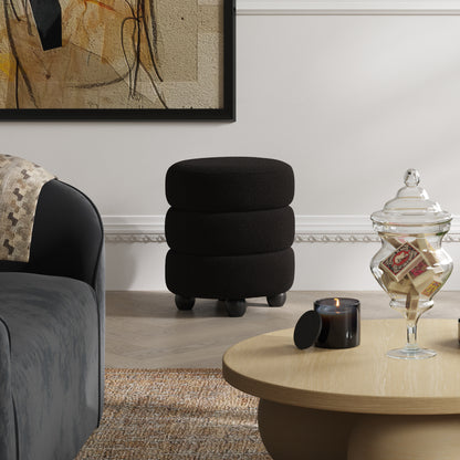 Black boucle pouffe with matte black legs