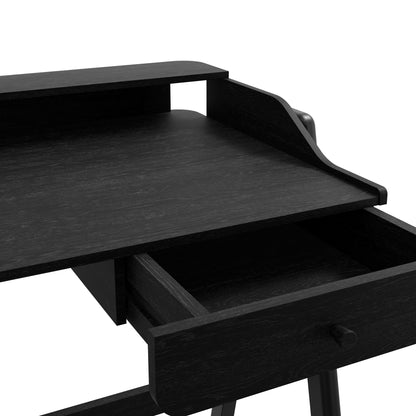 Matte black desk with open drawer 