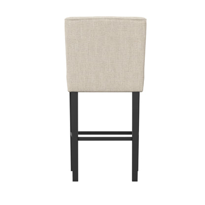 Beige linen wing backed stool with black legs