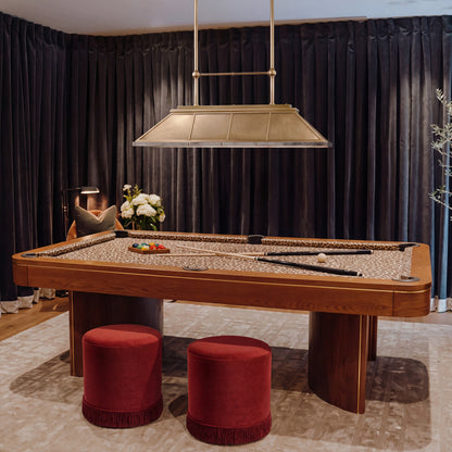 Two Red Velvet Round small Pouffes in a games room