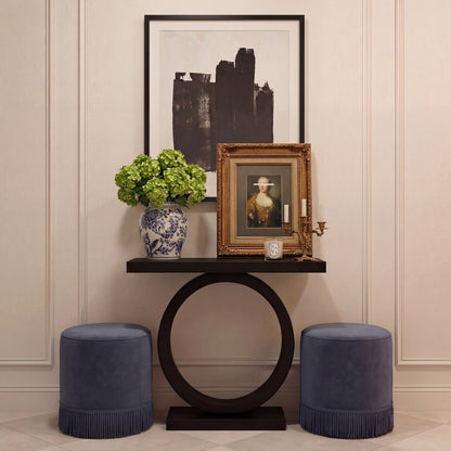 Two Blue Velvet Round small Pouffe in a modern hall way 