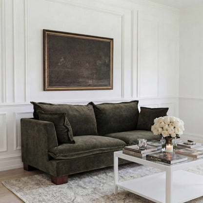 Olive 3 seater soft Sofa in a neutral coloured living room