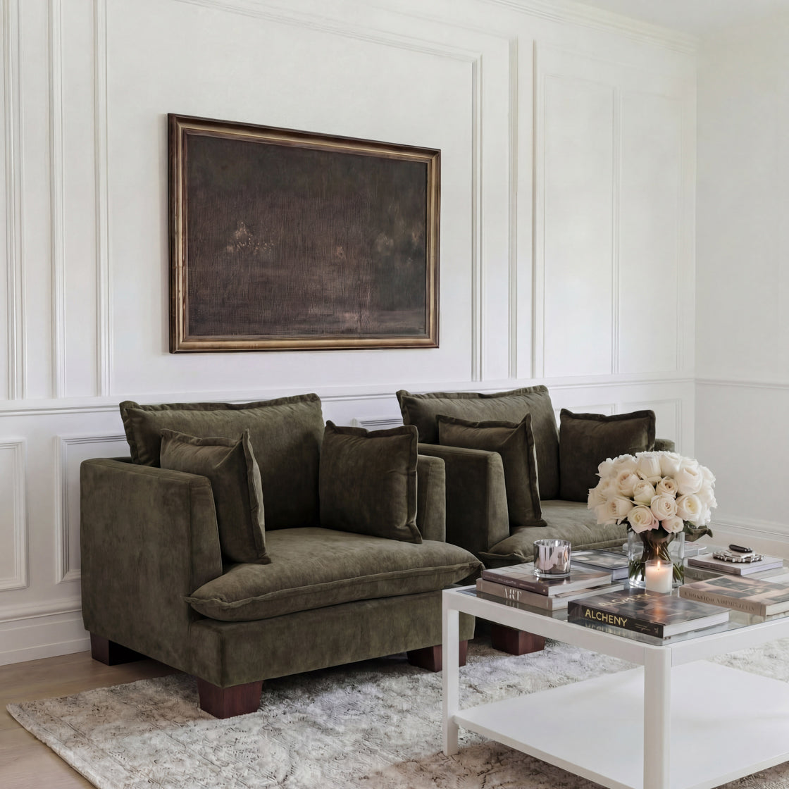 two Olive Single soft Armchairs in a neutral coloured room